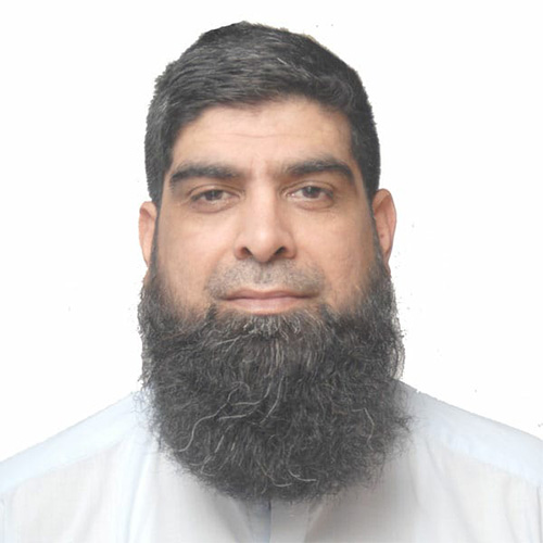 Tariq Kamal has a long, black beard